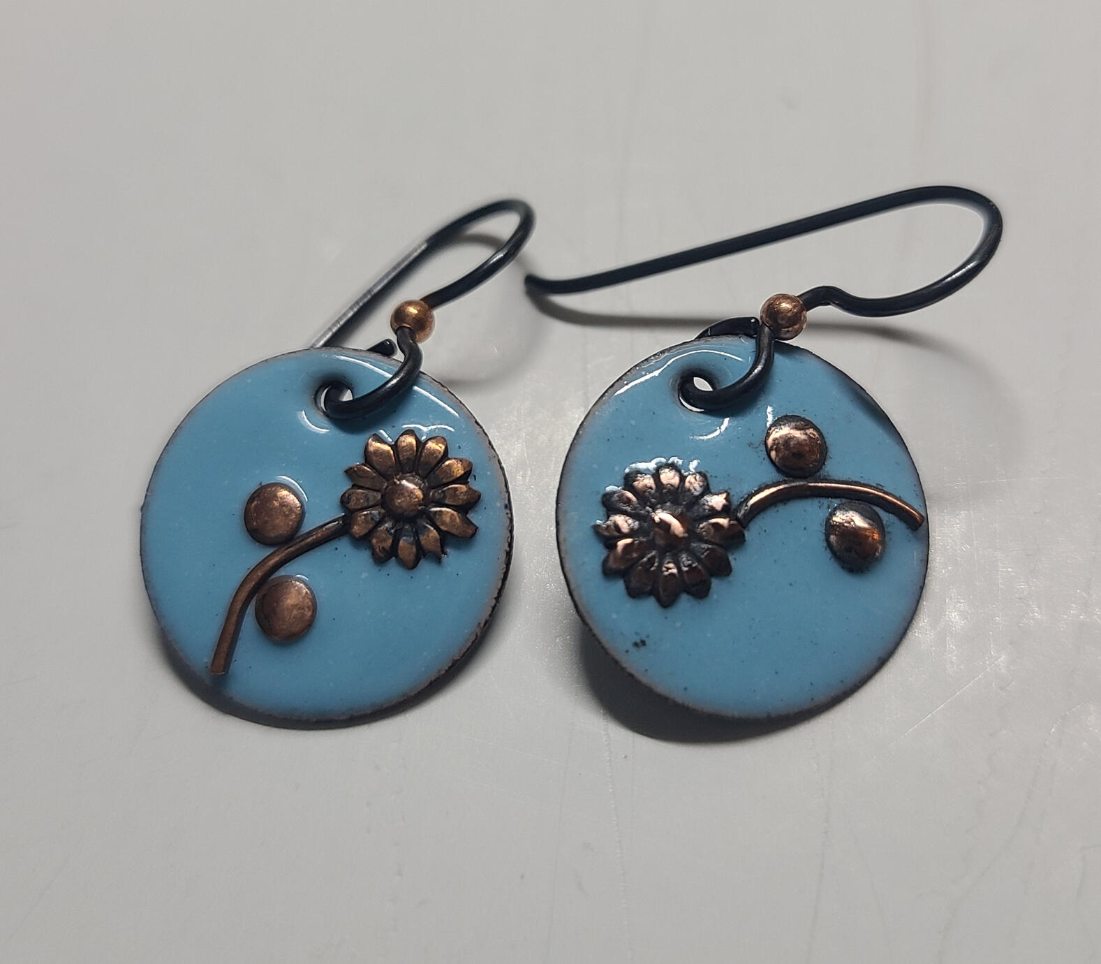 Wee copper flowers